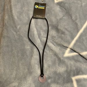 New with tags pale pink n black necklace feels n looks like sea glass